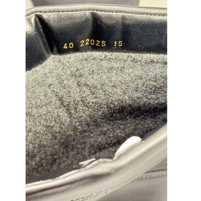 Topman Talvikas eräkengät hiihtorantilla musta